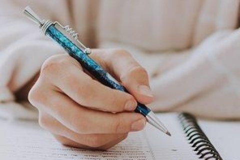 Foto von schreibender Hand