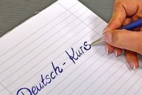Block mit Schrift "Deutsch-Kurs"